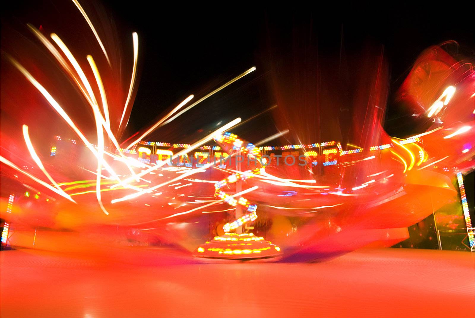 Blur neon lights in amusement park, long exposure