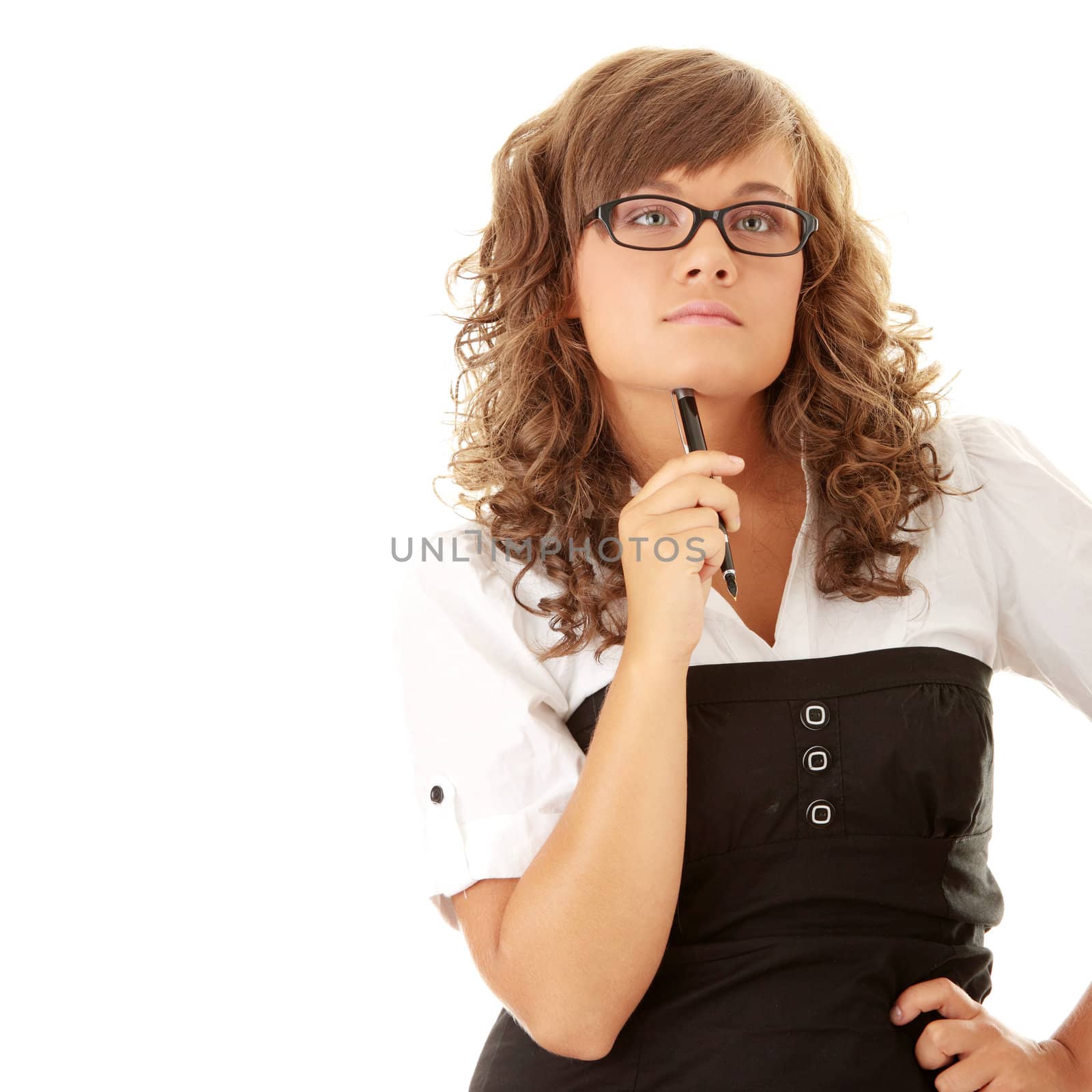 Beautiful student smiling with pen in hand isolated over white