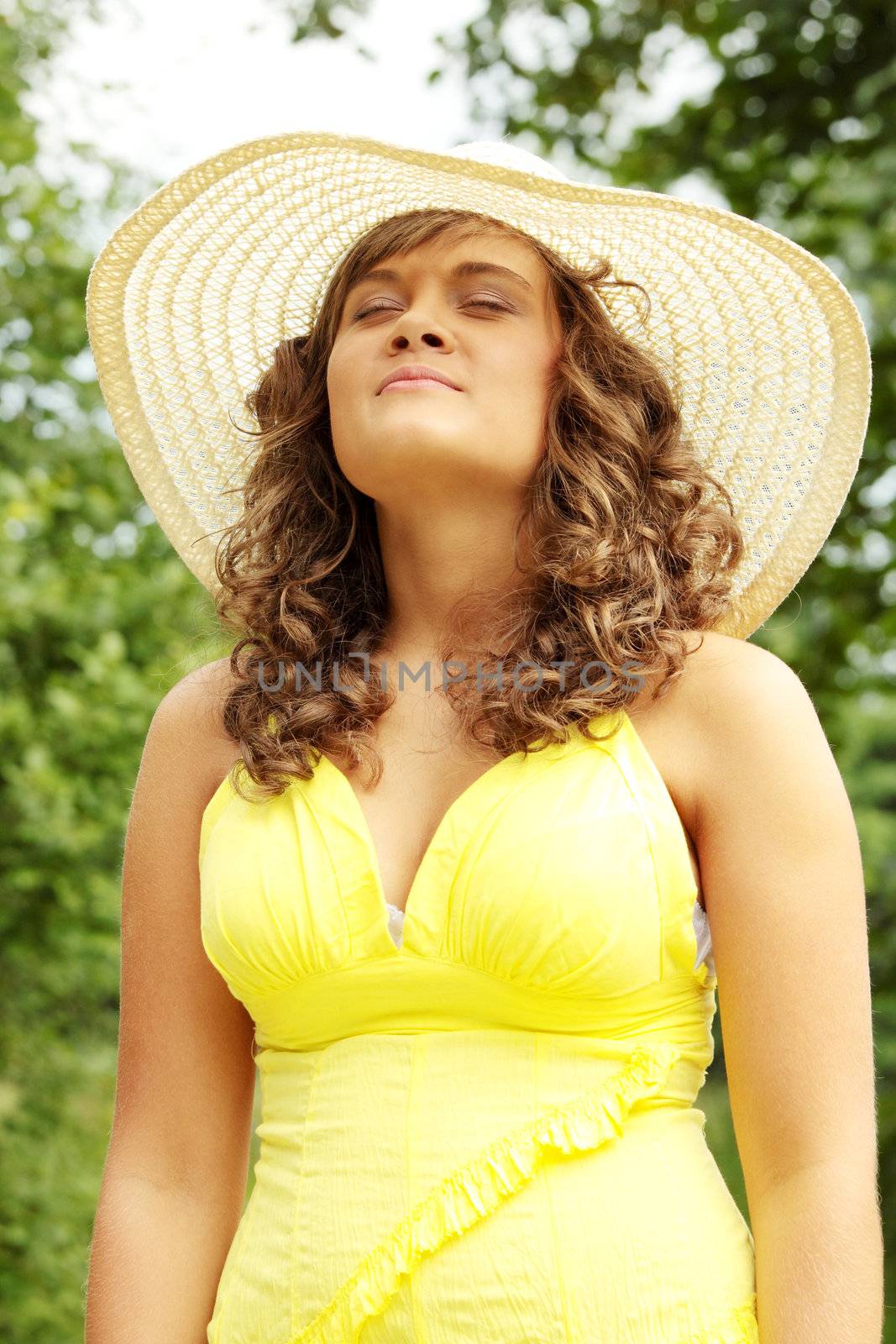 A portrait of a beautiful woman in a countryside