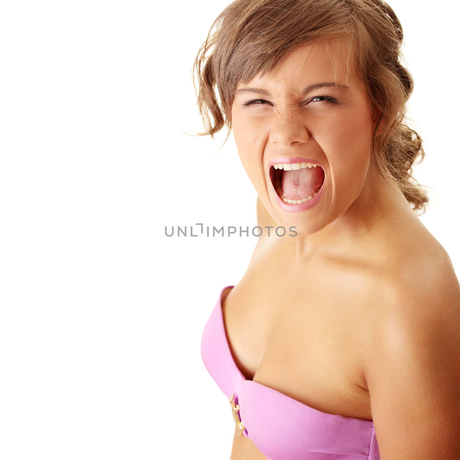 Cute young woman in swimsuit screaming isolated