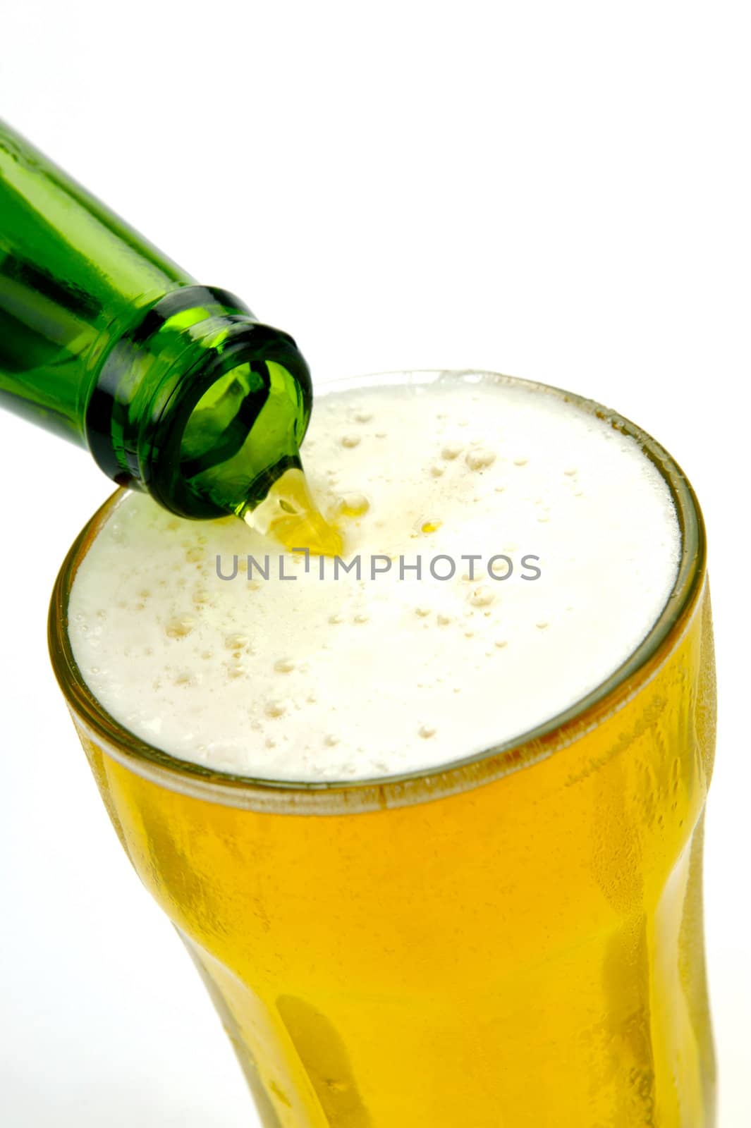 Glasses of beer isolated against a white background
