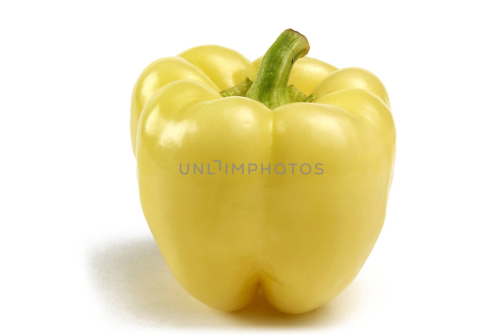 One yellow pepper isolated on white