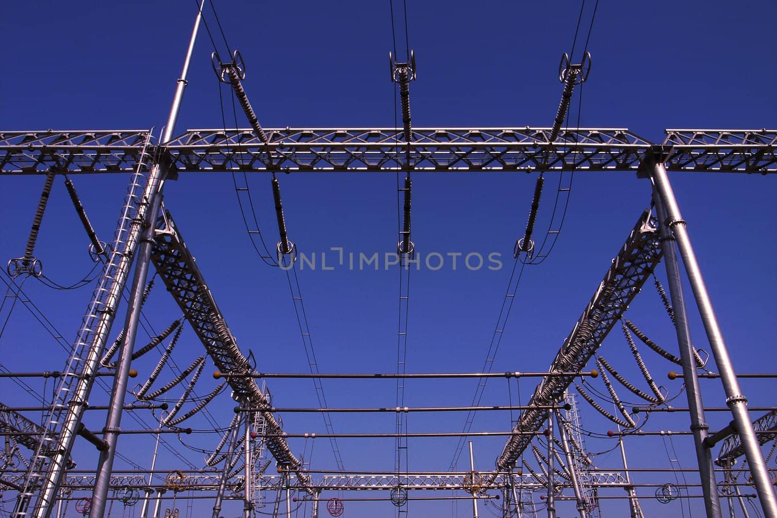 View of the high voltage transmission lines in a heat power plant