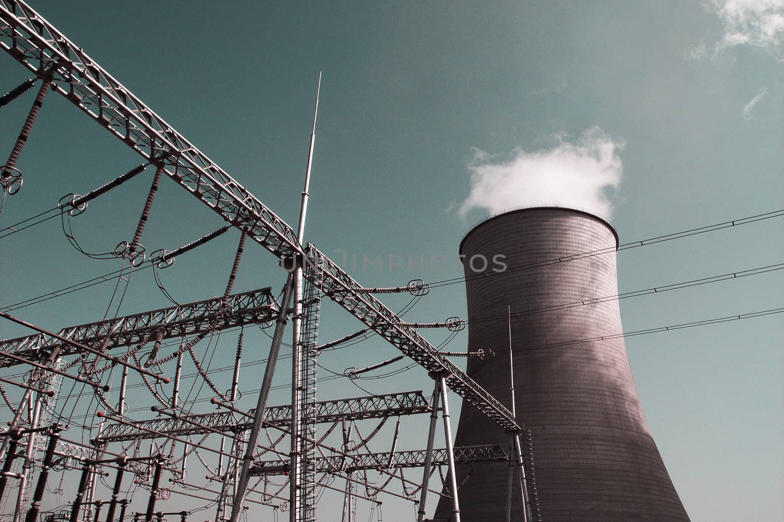 View of the high voltage transmission lines in a heat power plant