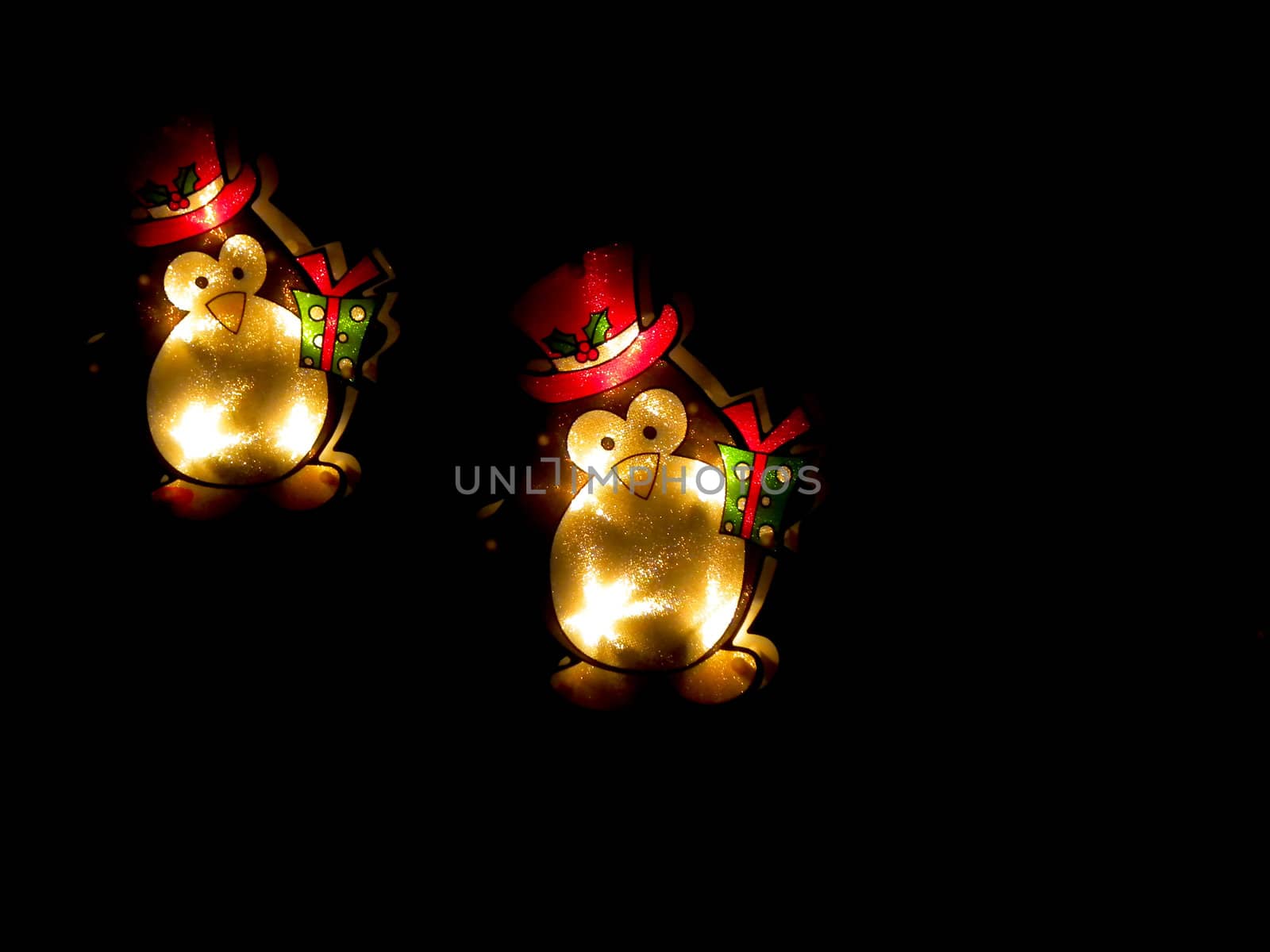 Happy little penguin Christmas lights on black