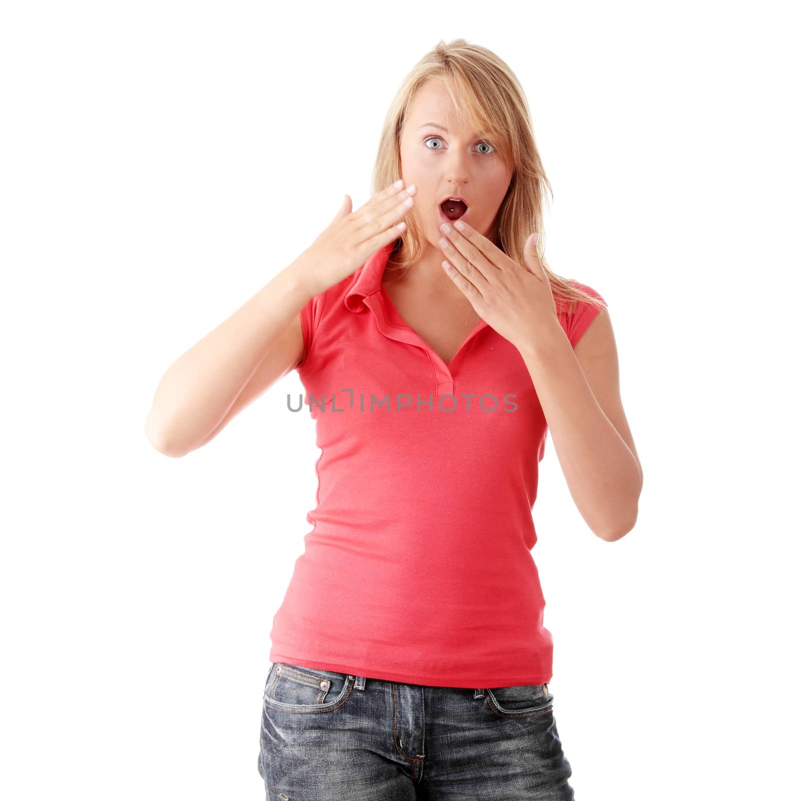 Casual caucasian blonde woman suprised over white background