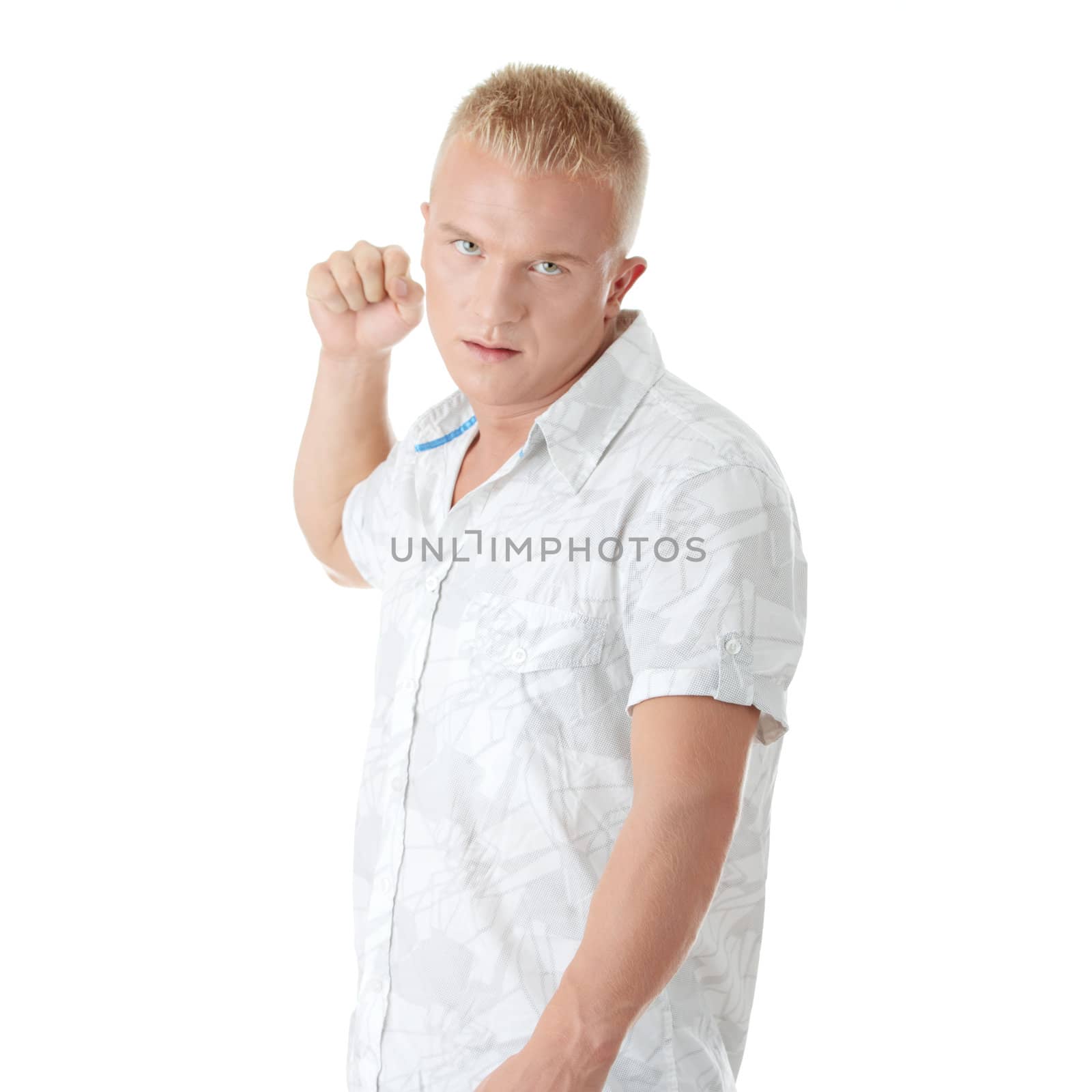 Casual caucasian blond male punching isolated on white