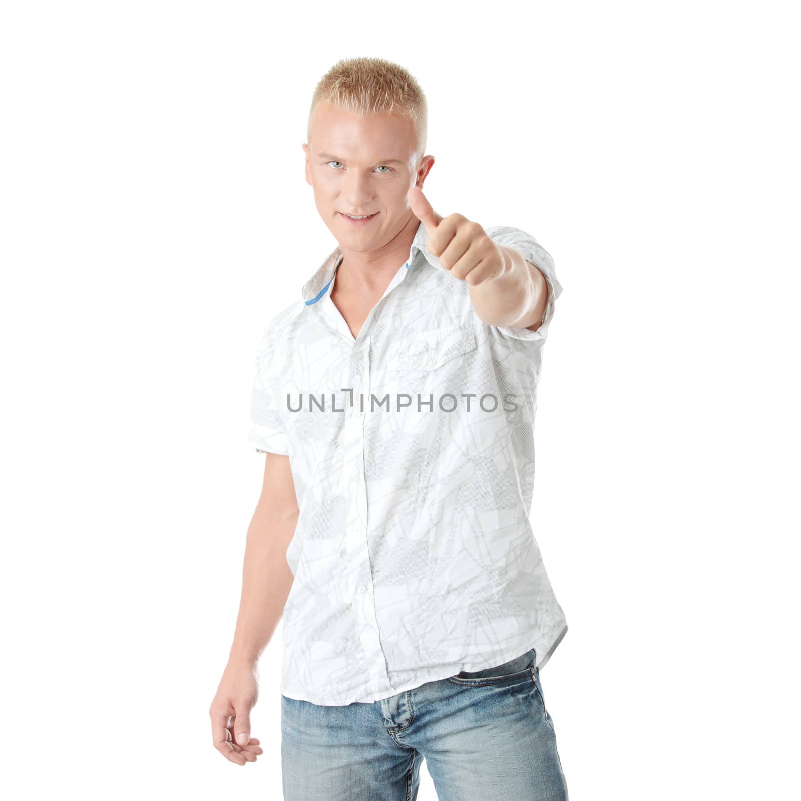 Young casual man portrait doing the thumbs up sign in a white background