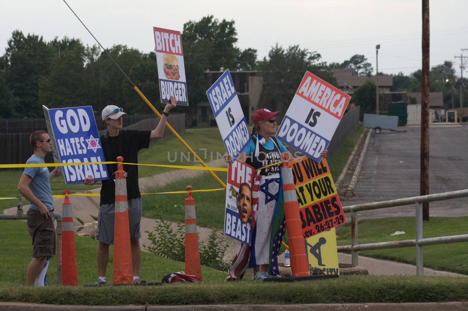 OKLAHOMA CITY, OK - SEPTEMBER 18, 2009: Members of the Westboro Baptist Church of Topeka, Kansas Demonstrate outside Temple B'nai Israel in Oklahoma City on September 18, 2009, the eve of the Jewish holiday Rosh Hashanah.