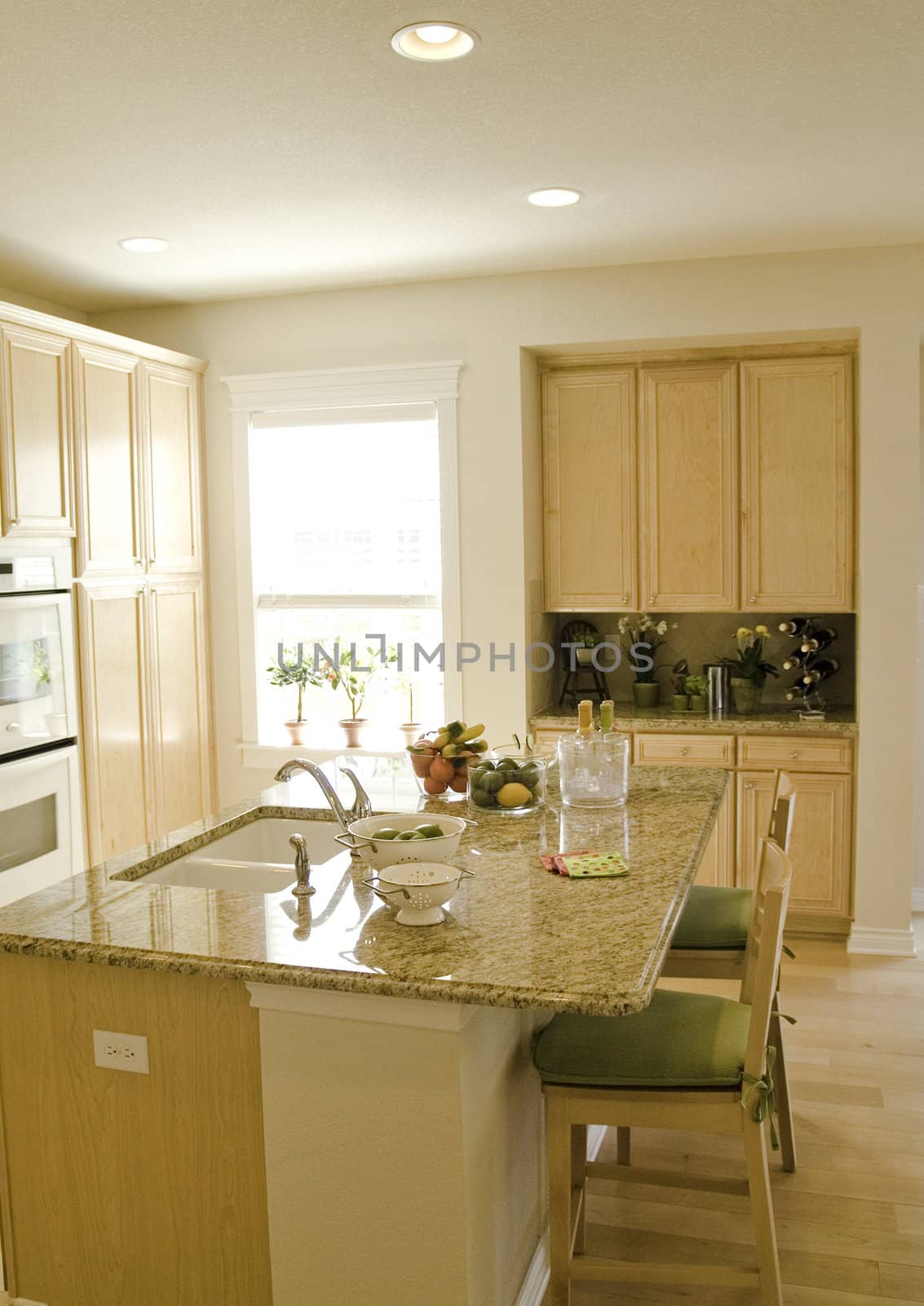 modern kitchen with light colored cabinets