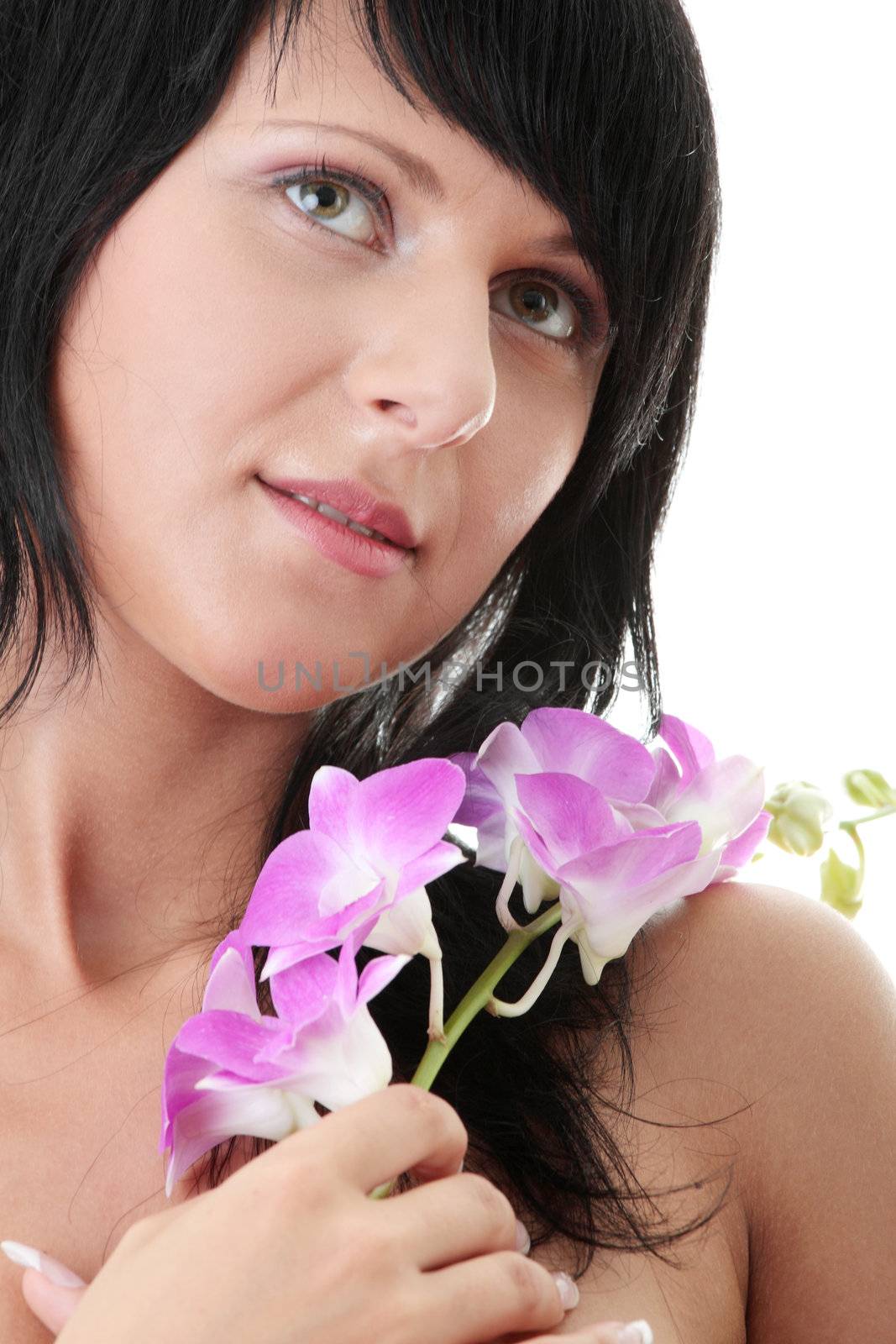 Beautiful Caucasian woman and orchid isolated on white - spa concept