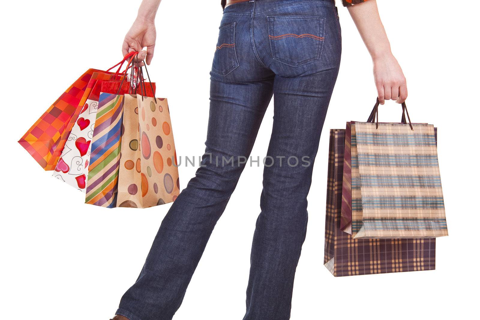 Woman holding shopping bags by adamr