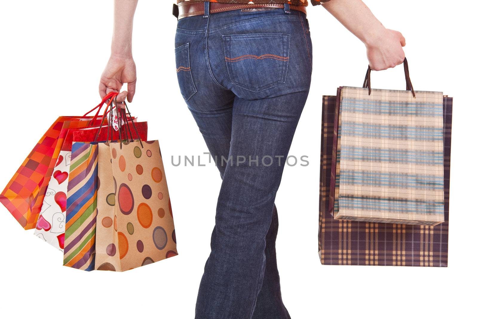 Woman holding shopping bags by adamr