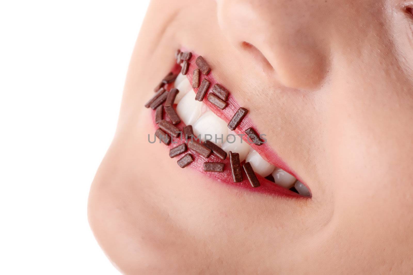 Teen girl with chocolate on her lips isolated