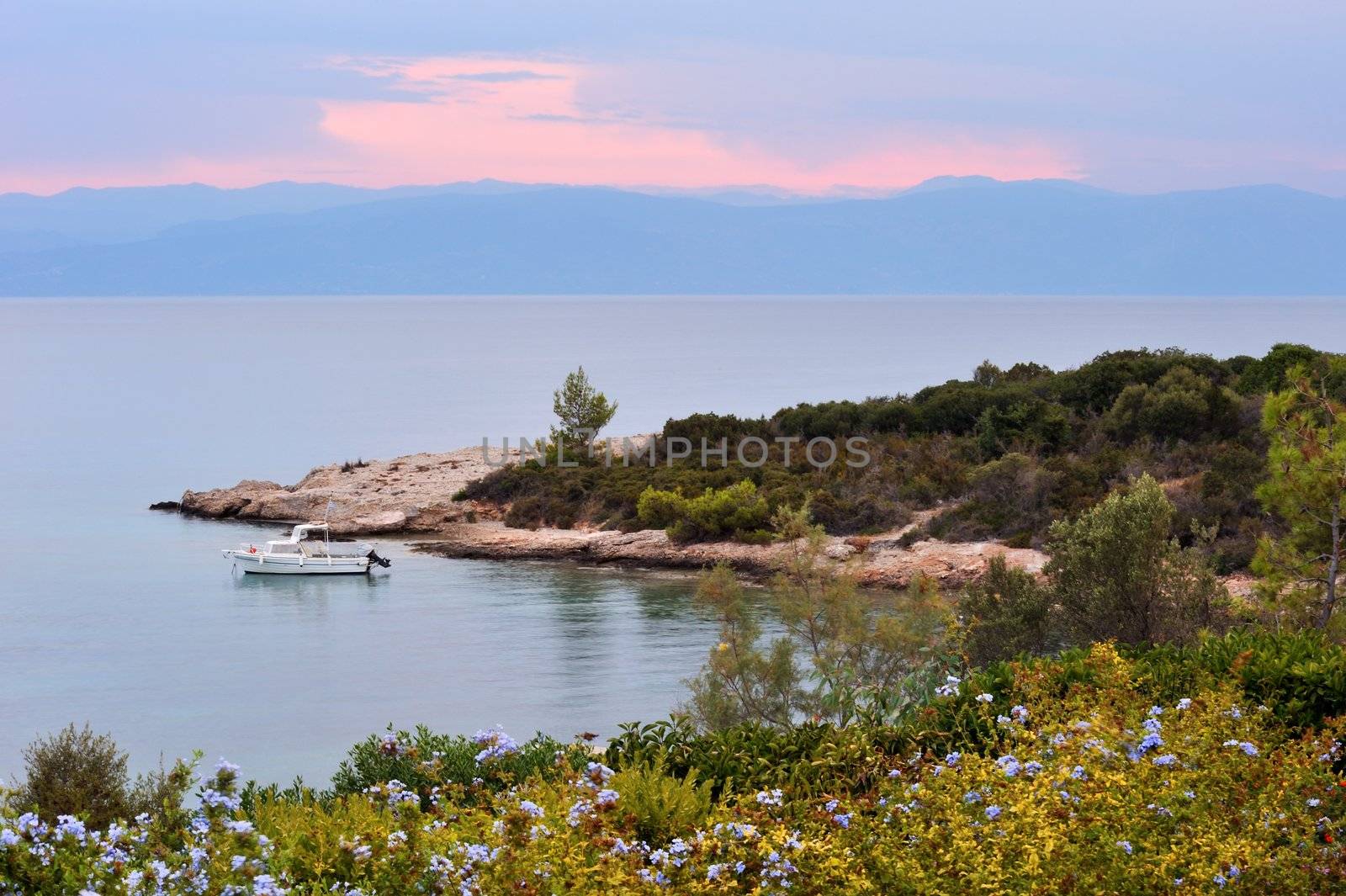 Picture of a serene seascape in Greece during late afternoon