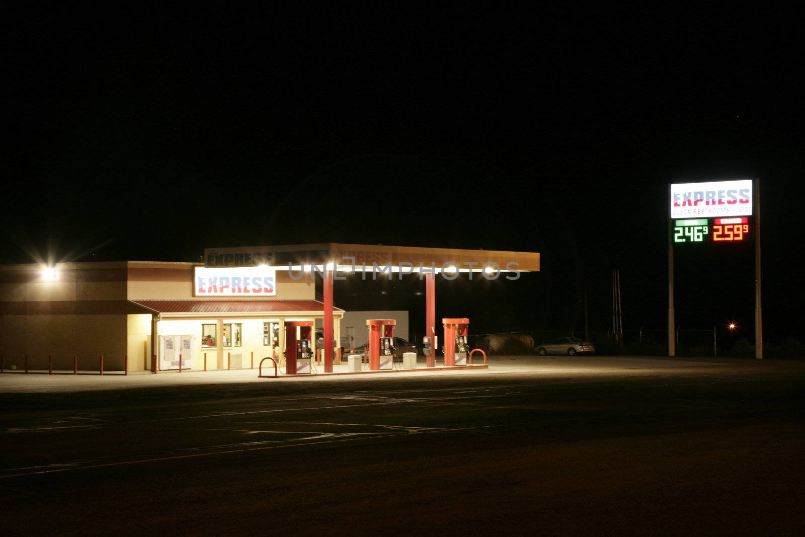 view of a no name gas station at night 