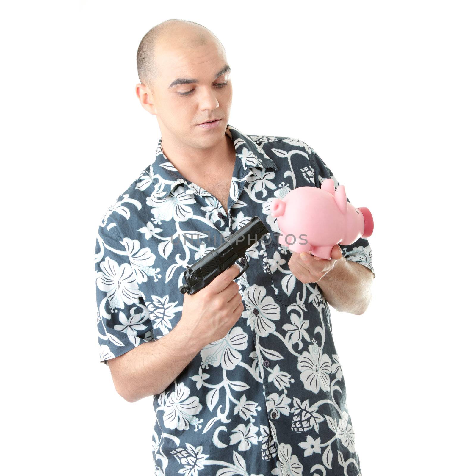 Man with gun pointing at piggy bank isolated on white