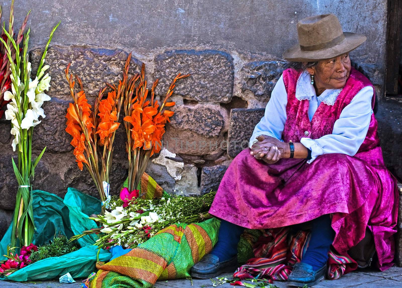 Cusco , Peru - May 27 : Peruvian woman in a market in Cusco Peru , May 27 2011