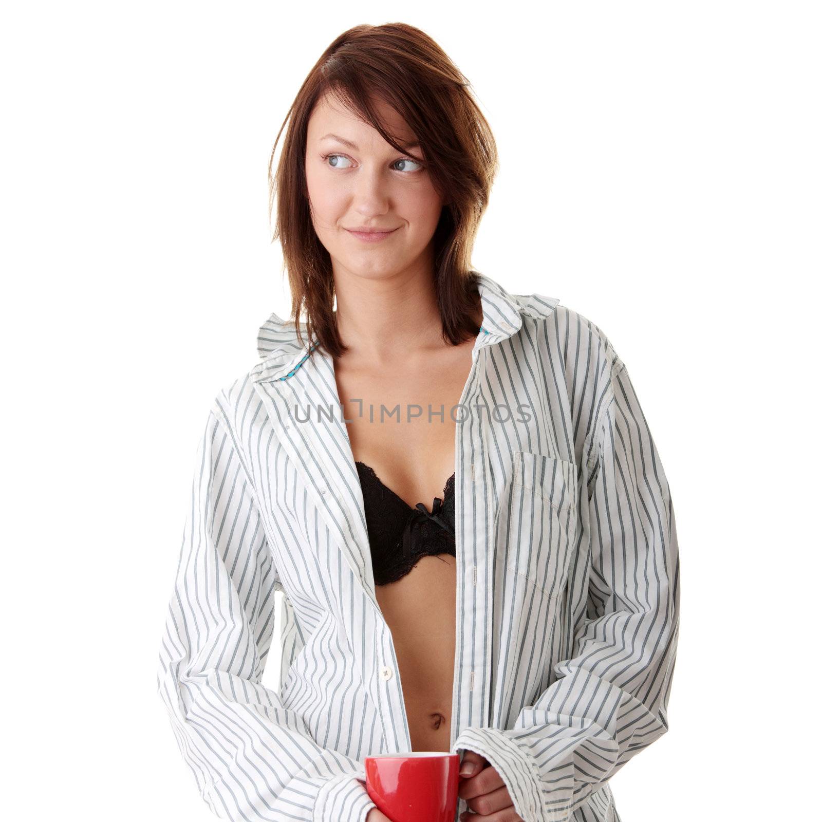 Young woman drinking morning coffe isolated on white background
