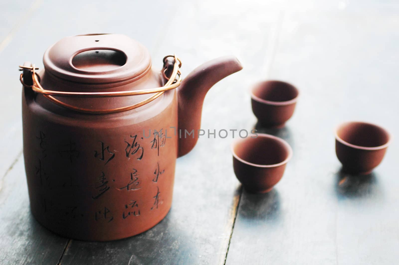 Traditional Chinese tea set on an old table