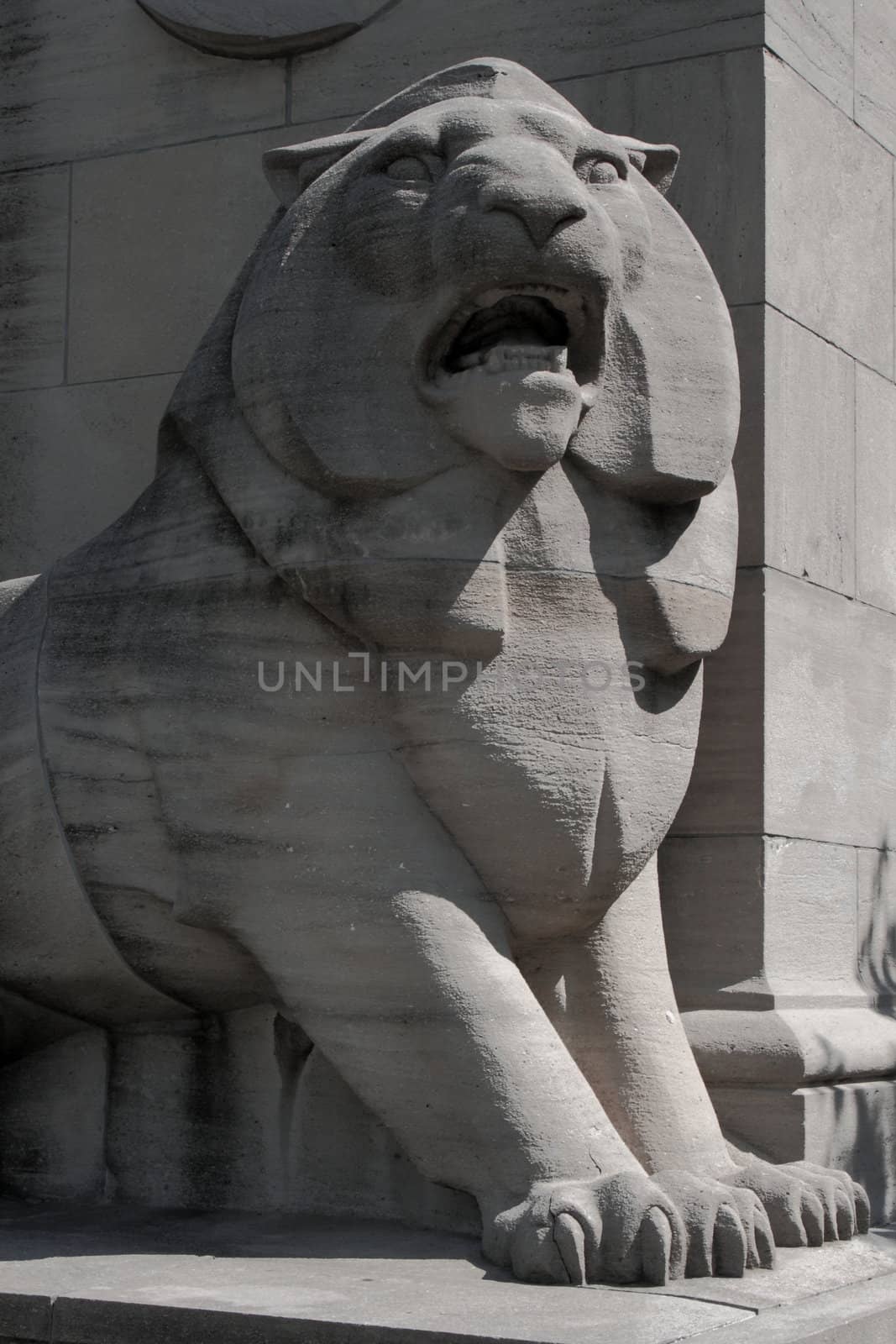 lion cement statue at toronto lakeshore park