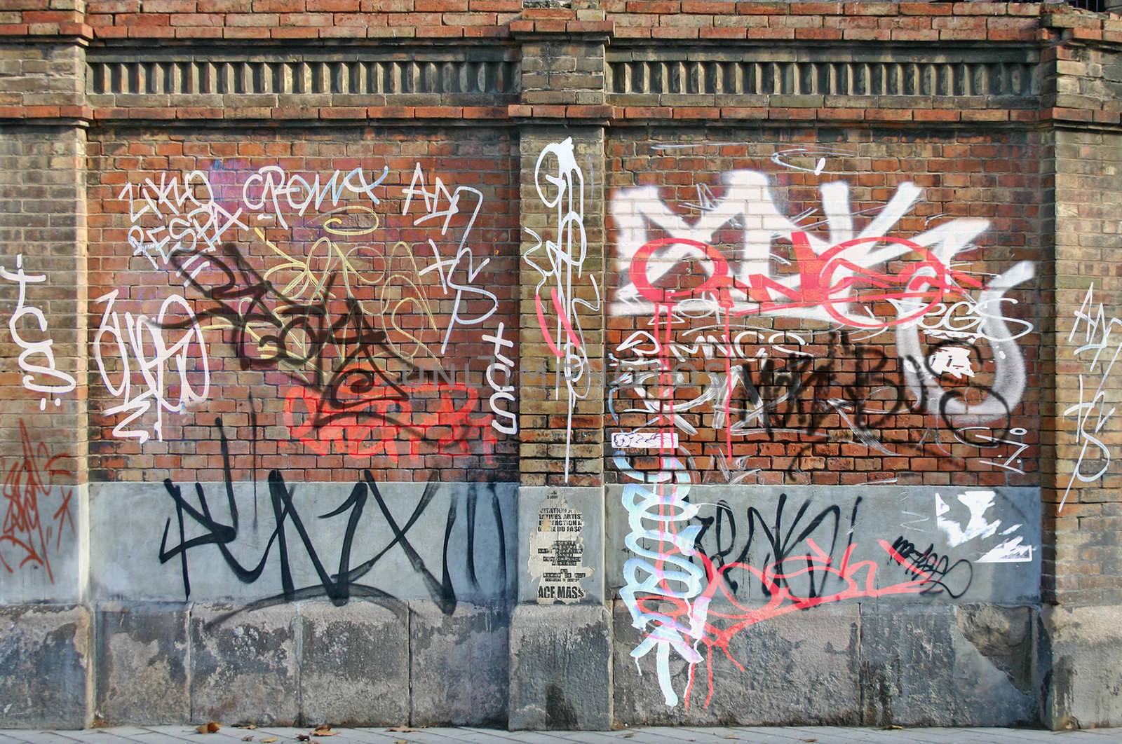 Old Brick Wall with lots of Graffiti