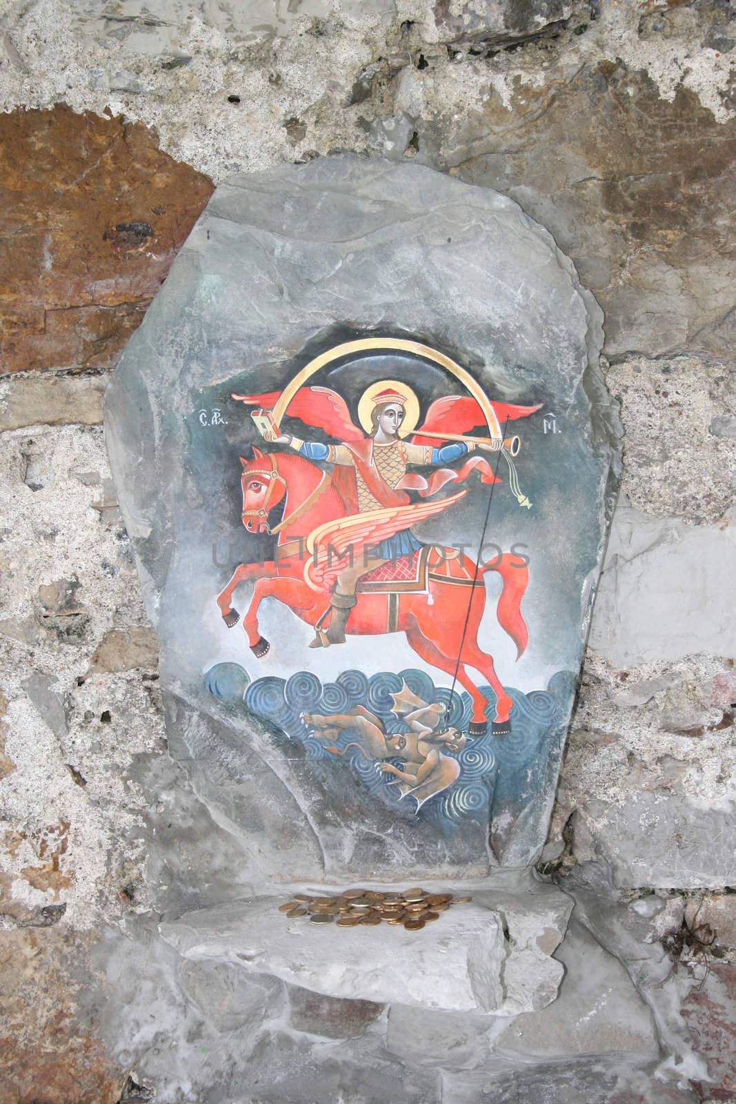 icon of Saint George painted on stone 