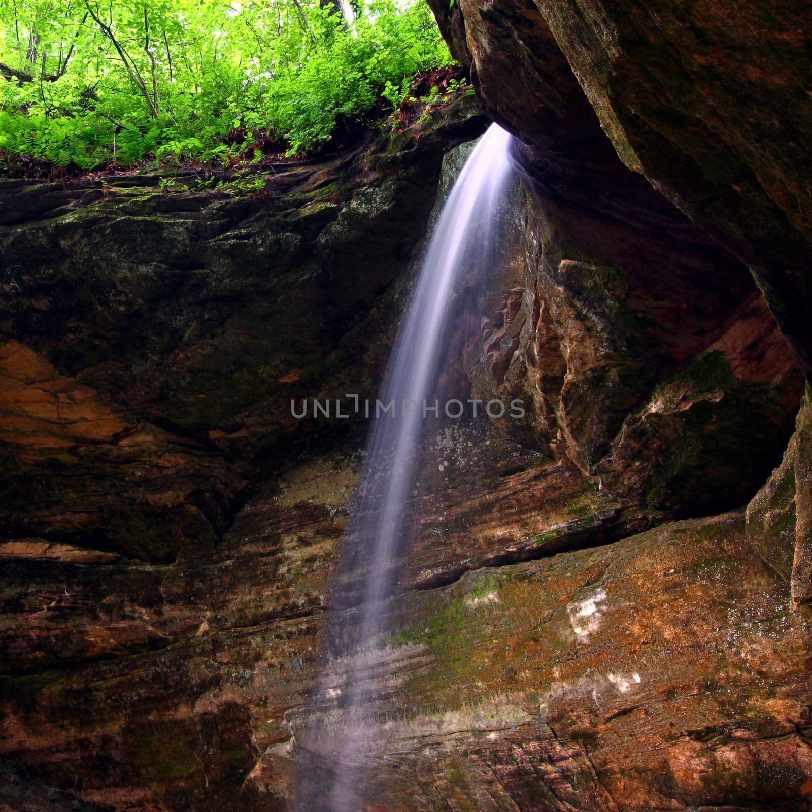 Water flows over beautiful Owl Canyon Falls at Starved Rock State Park of Illinois.
