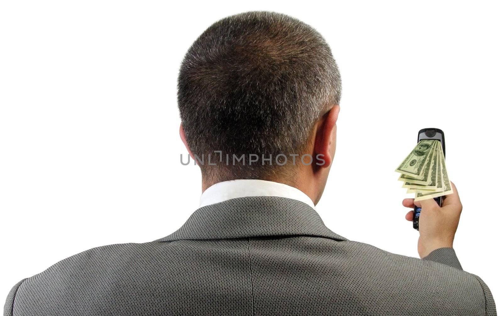 Abstract image of a businessman checking financial information on his mobile phone through modern technology facilities.Intended motion blur on the money.          
