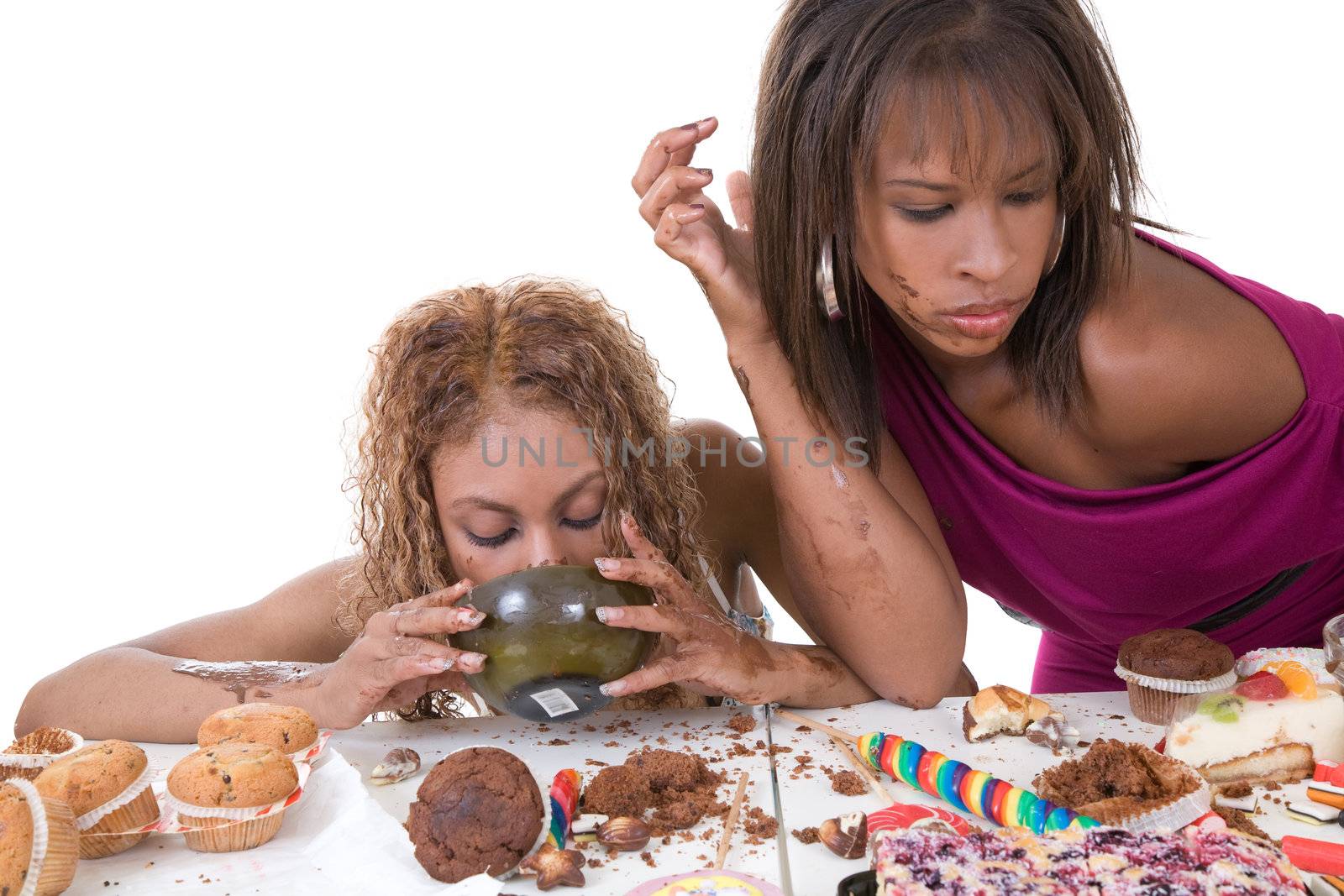 Two black girls in a horrible food binge
