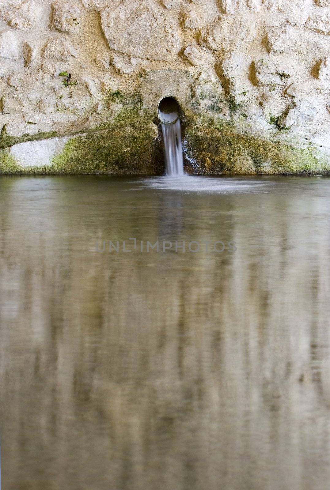 image of a fountain in a village of navarra spain