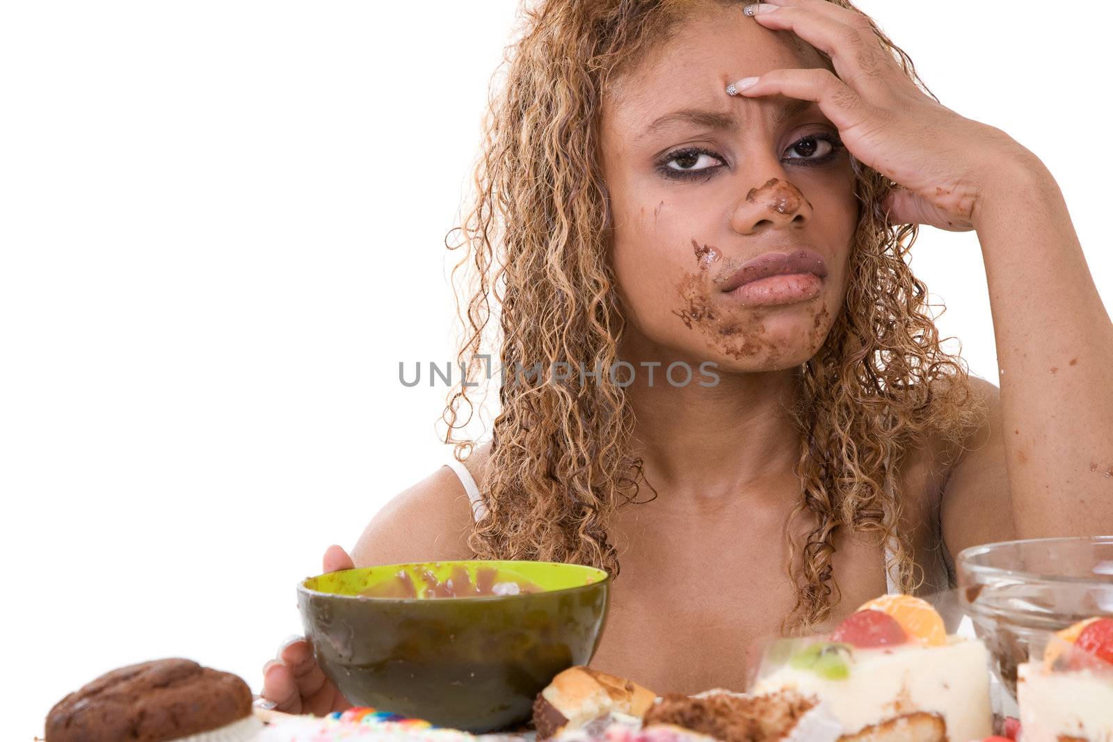 Pretty black woman looking very sick after having eating too much