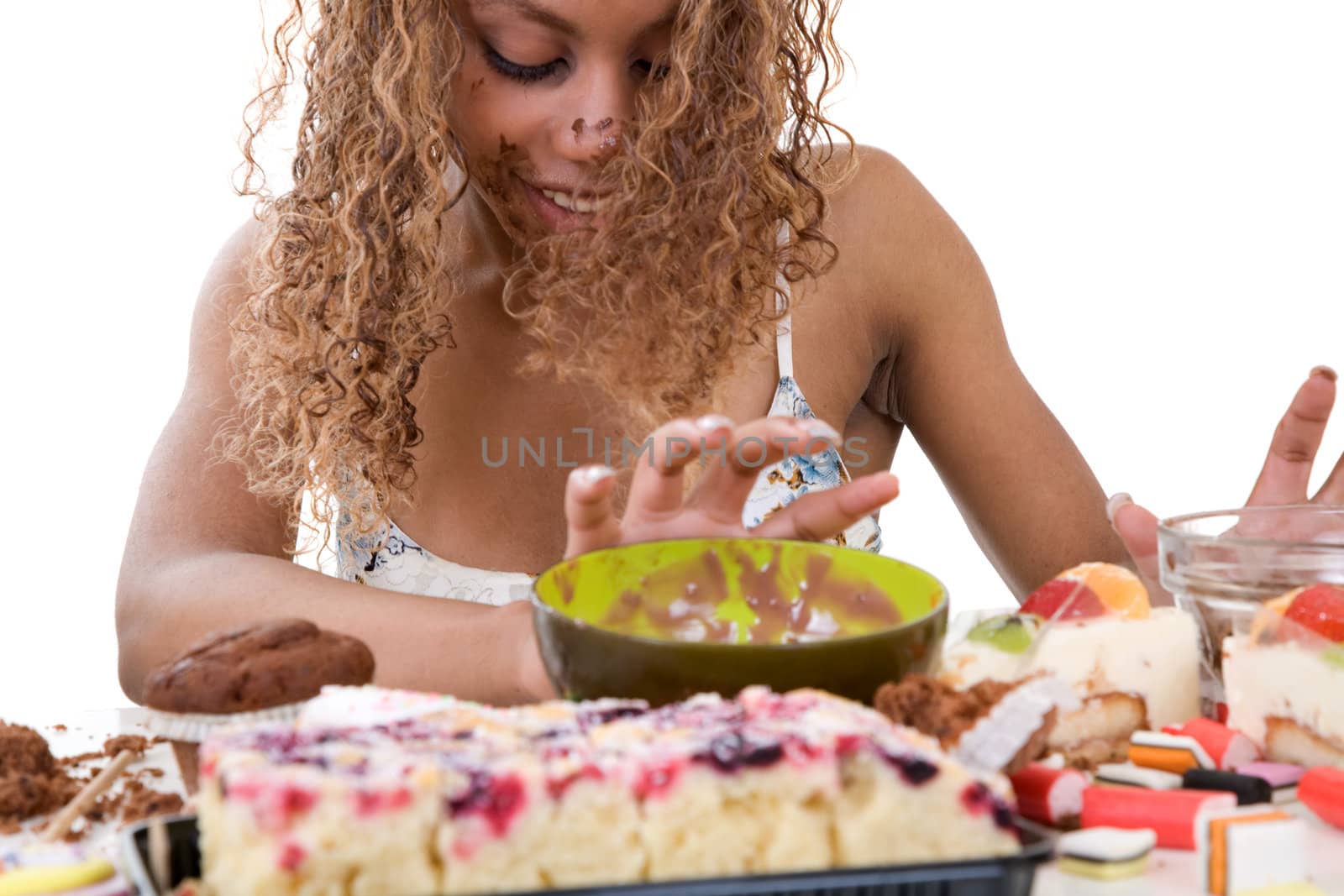 Pretty black girl pushing away the food she has just been devouring