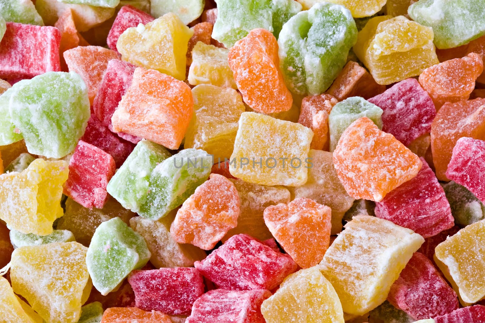 Set of multi-coloured sweet dried fruit slices close up
