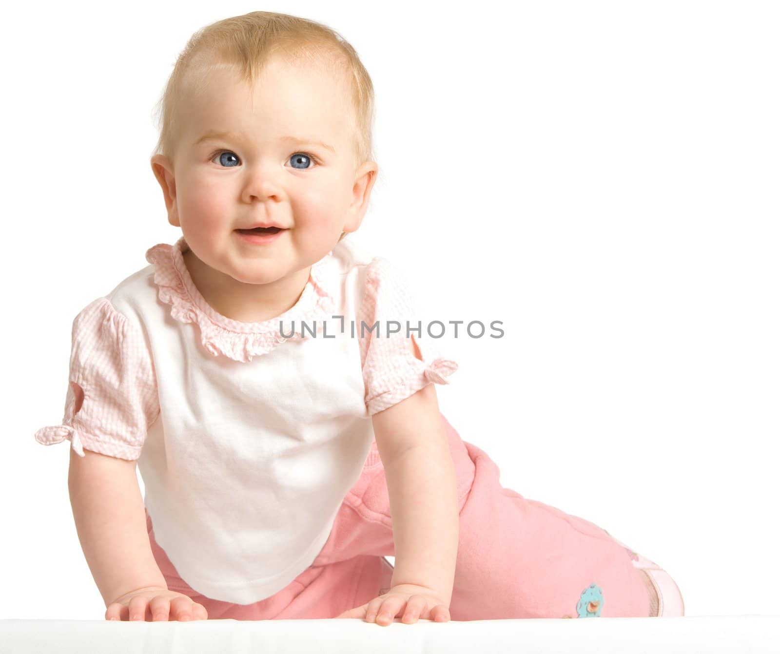 The nice small smiling girl creeps close up on a white background
