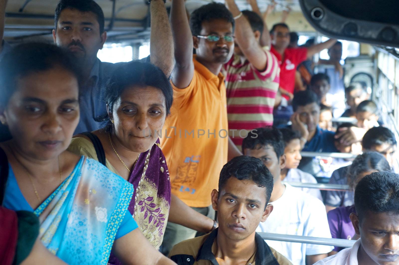 Colombo, Sri Lanka - February 22, 2011: Sri Lankan people inside public bus. 