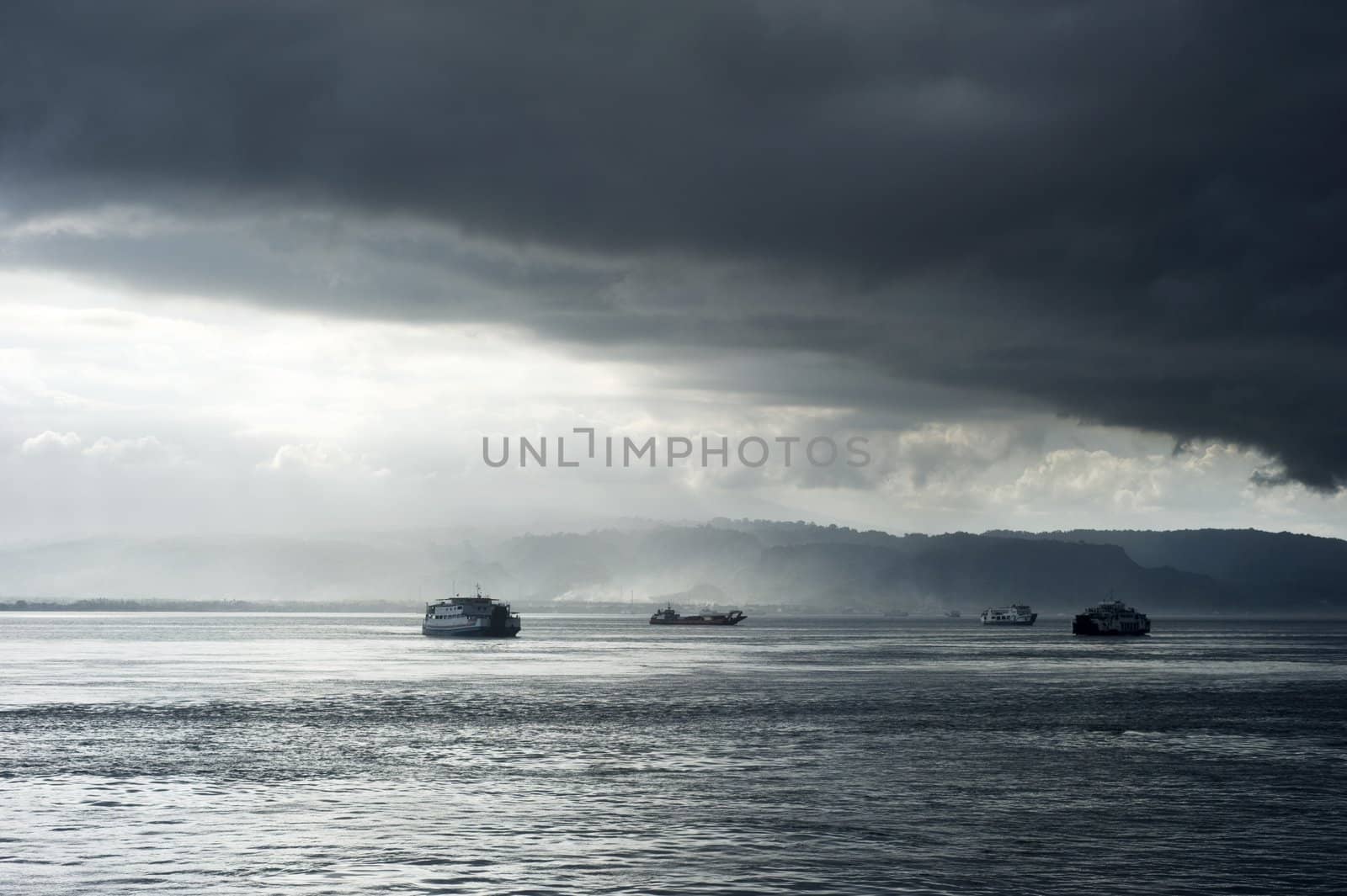 Ferry from Java to Bali under the storm. Indonesia