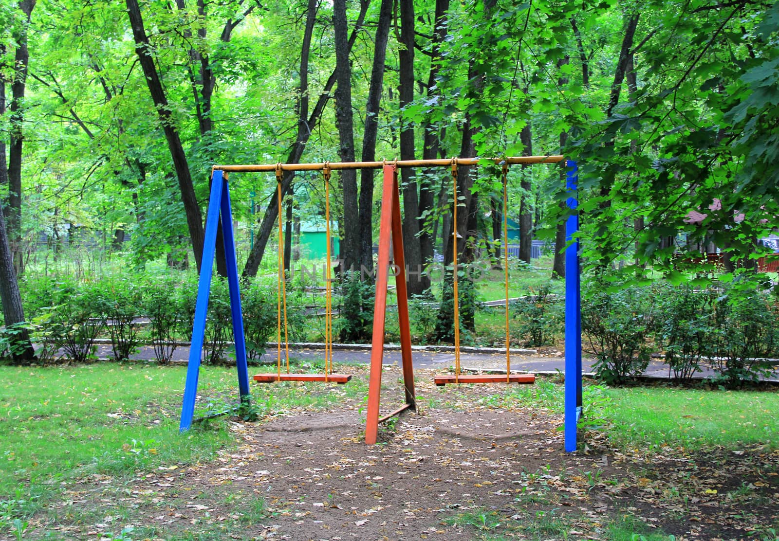 Summer landscape with children seesaw