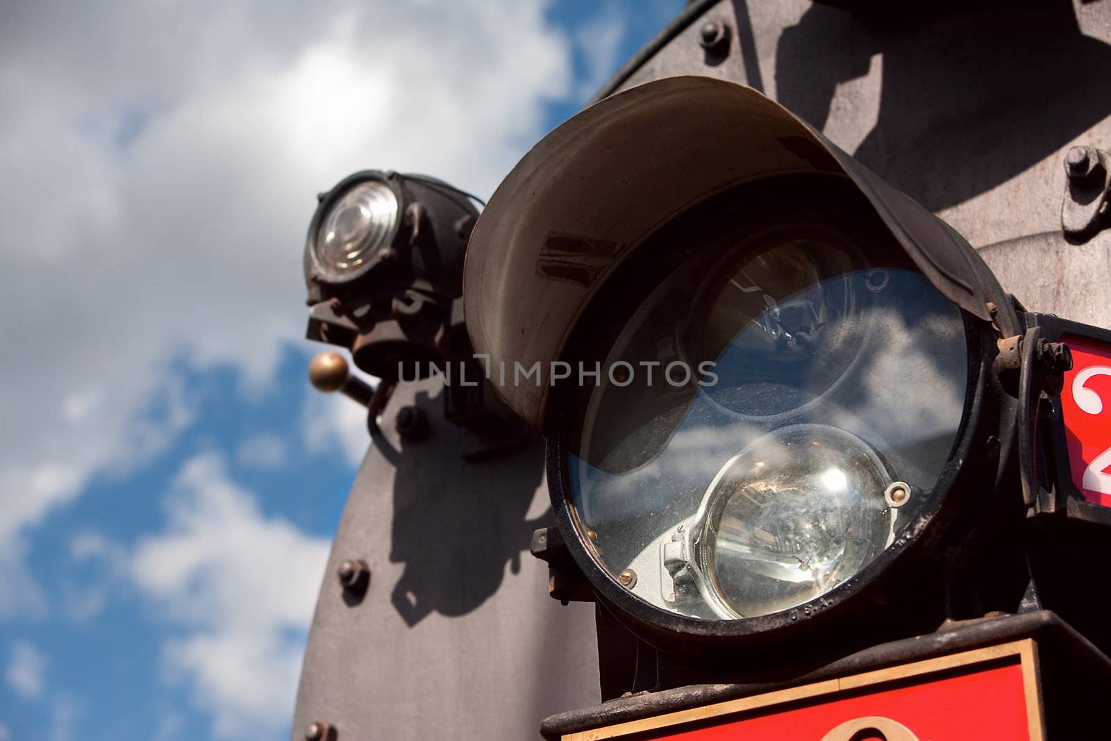 Light on the front of vintage steam engine train