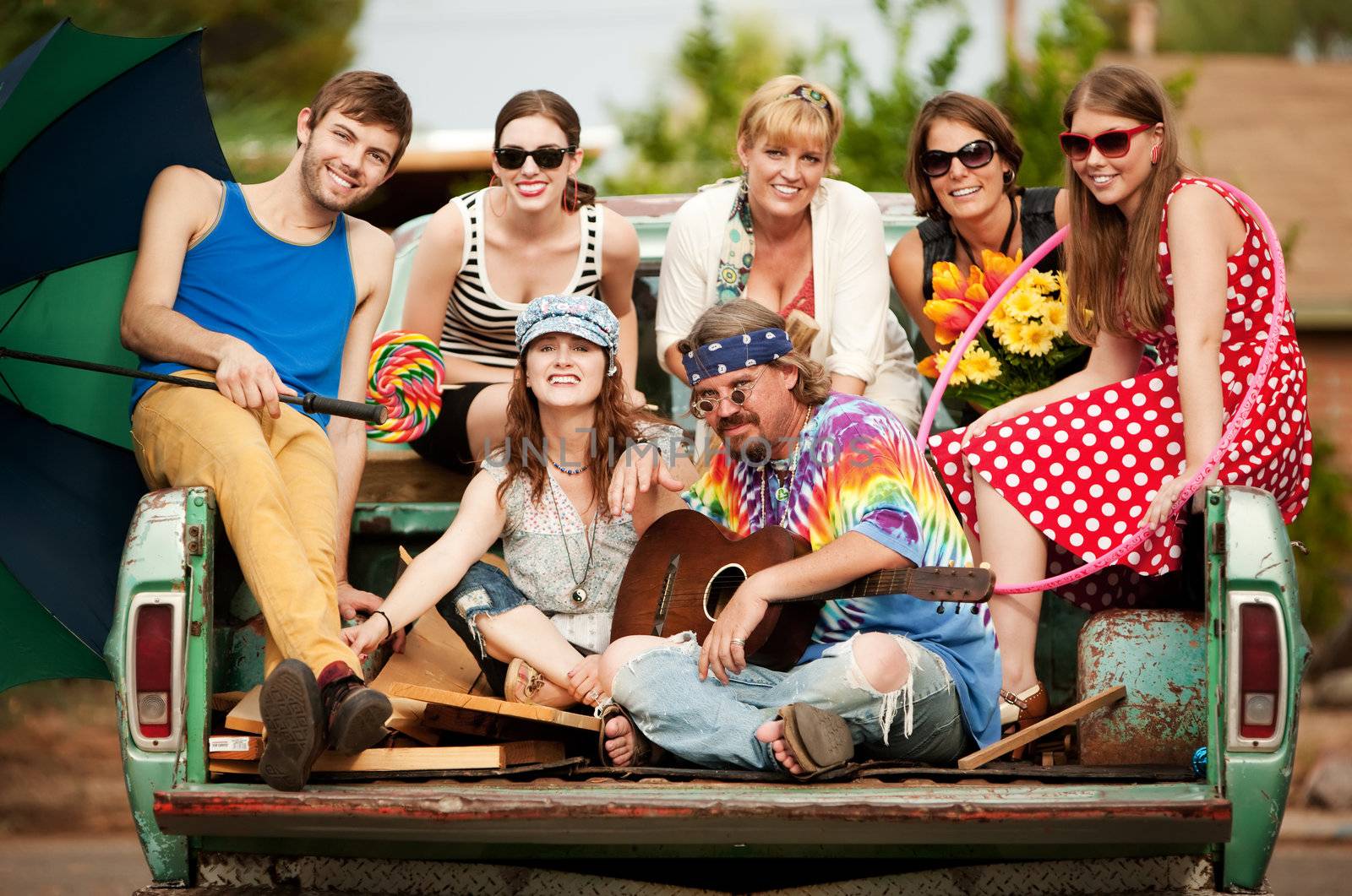 Groovy Group in the Back of Truck Smiling