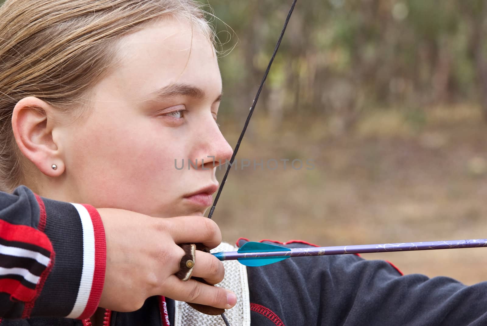teenage girl doing archery by clearviewstock