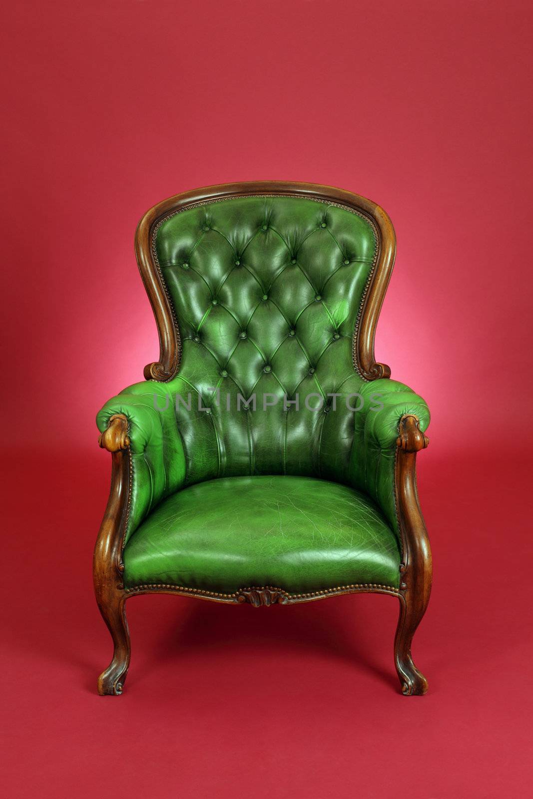 Green leather chair by sumners