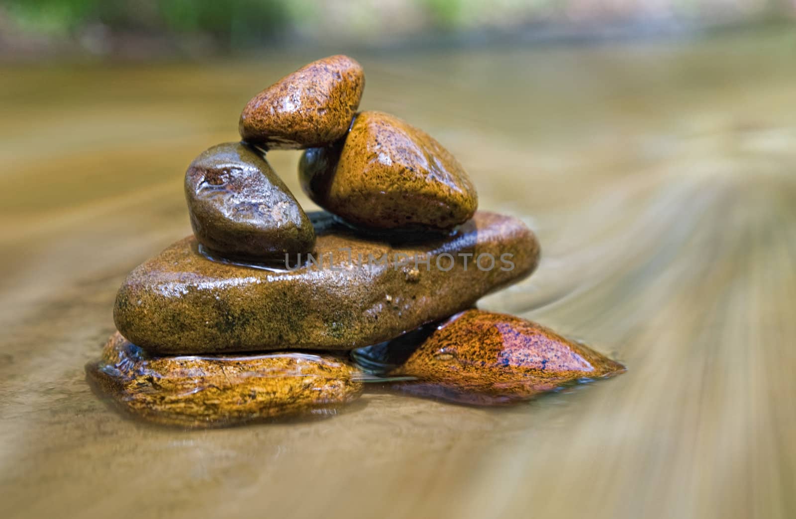 great image of a stack of rocks in a stream