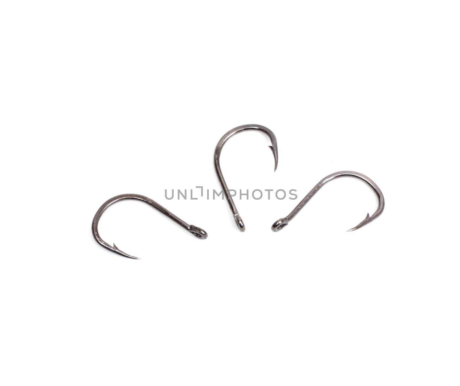 a fish hooks isolated on a white background  by schankz