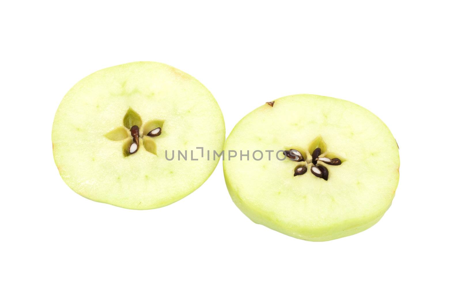 fresh green apple cut into slices. isolated on white background  by schankz