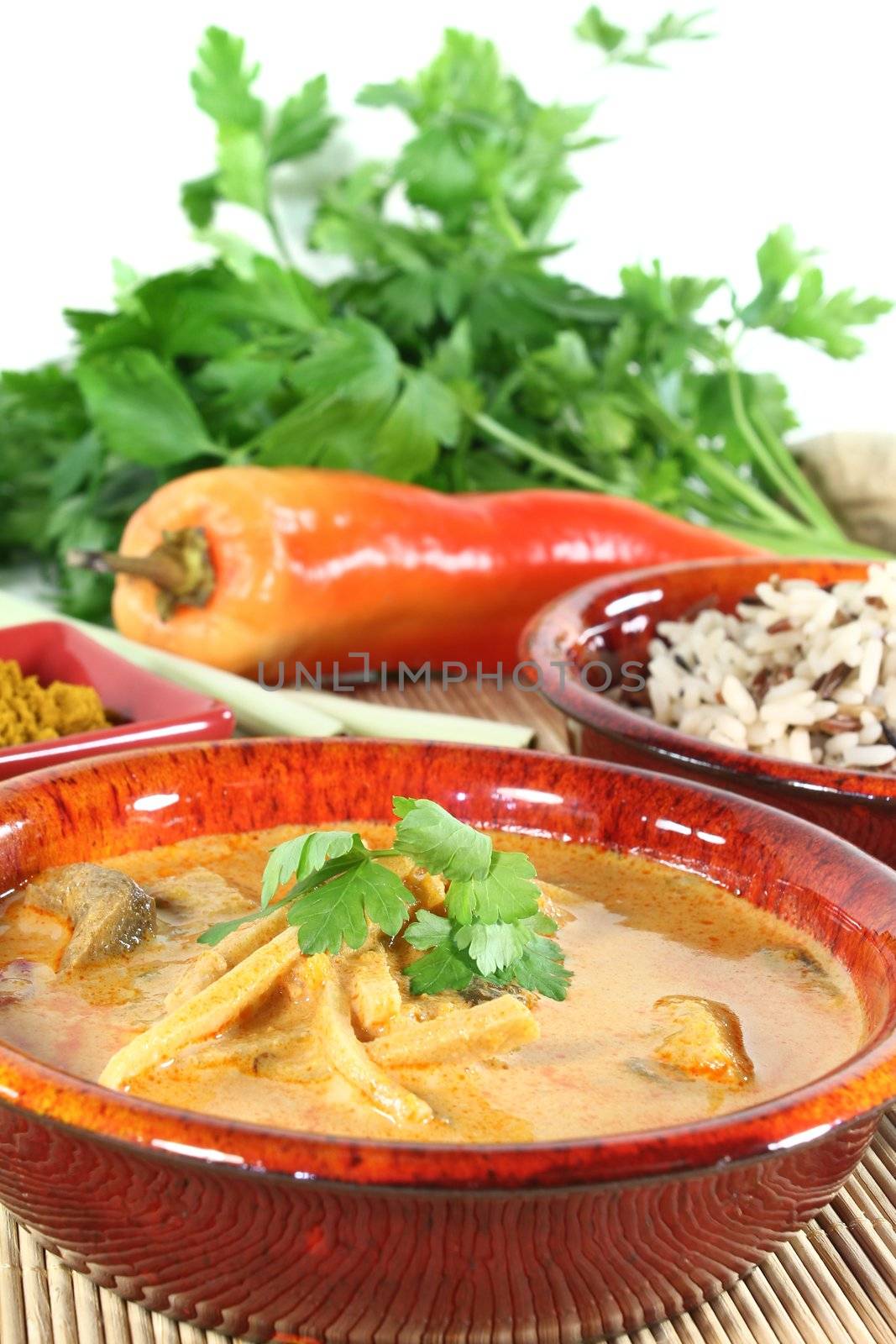 Indian yellow Curry with wild rice, chilli and bamboo shoots