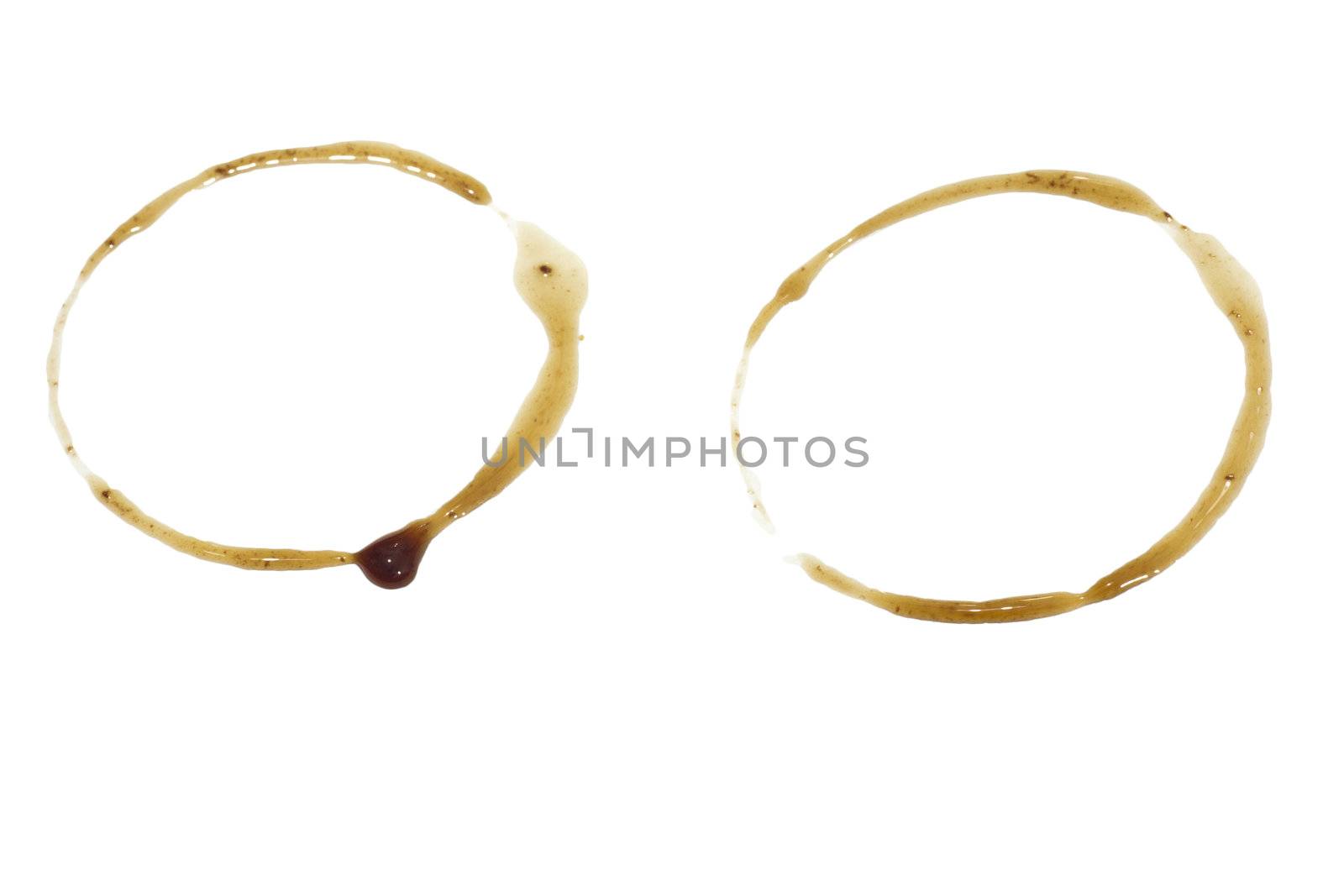 close up of coffee cup marks on white background  by schankz