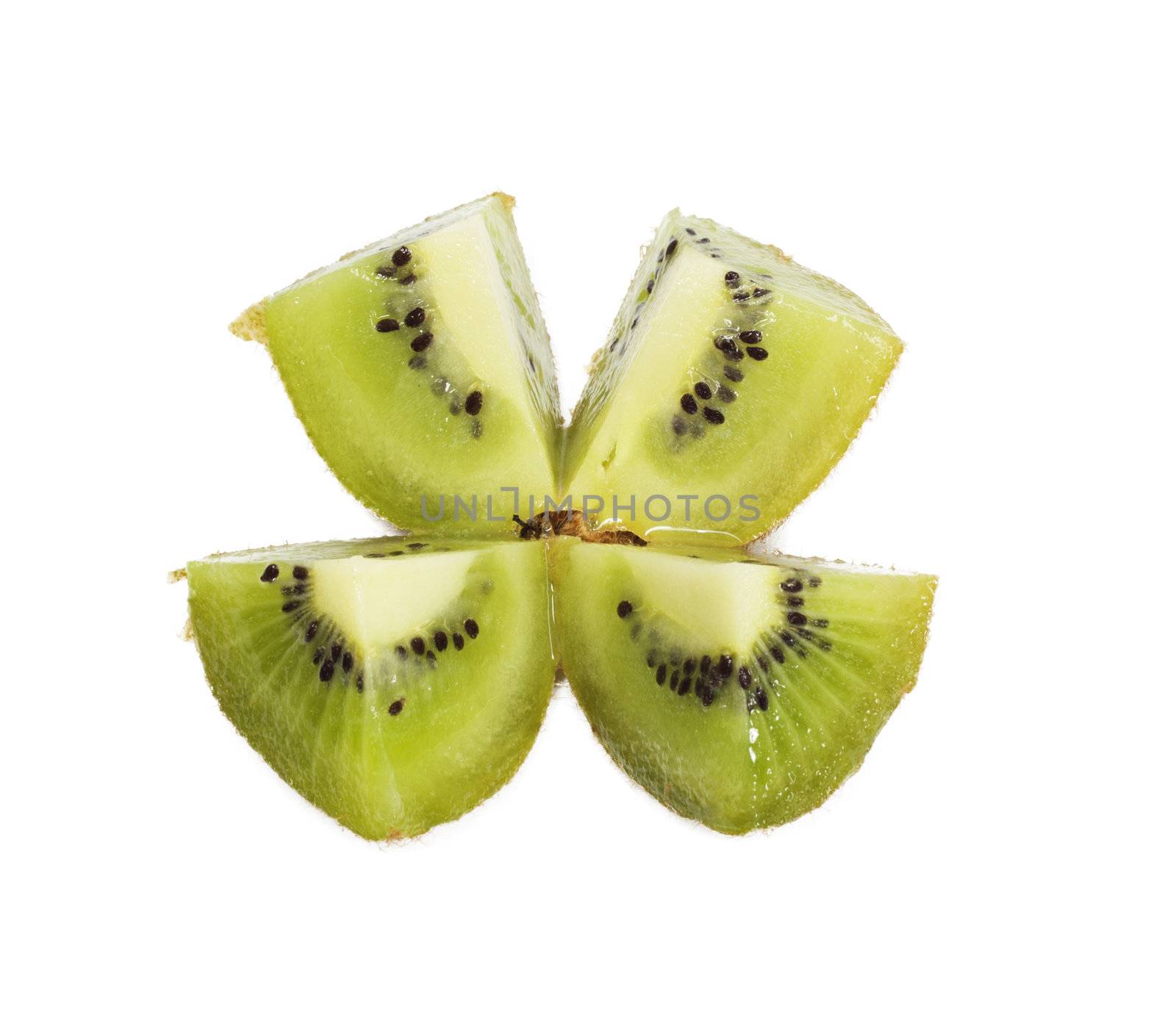 A kiwi fruit sliced open so the seeds are visible 