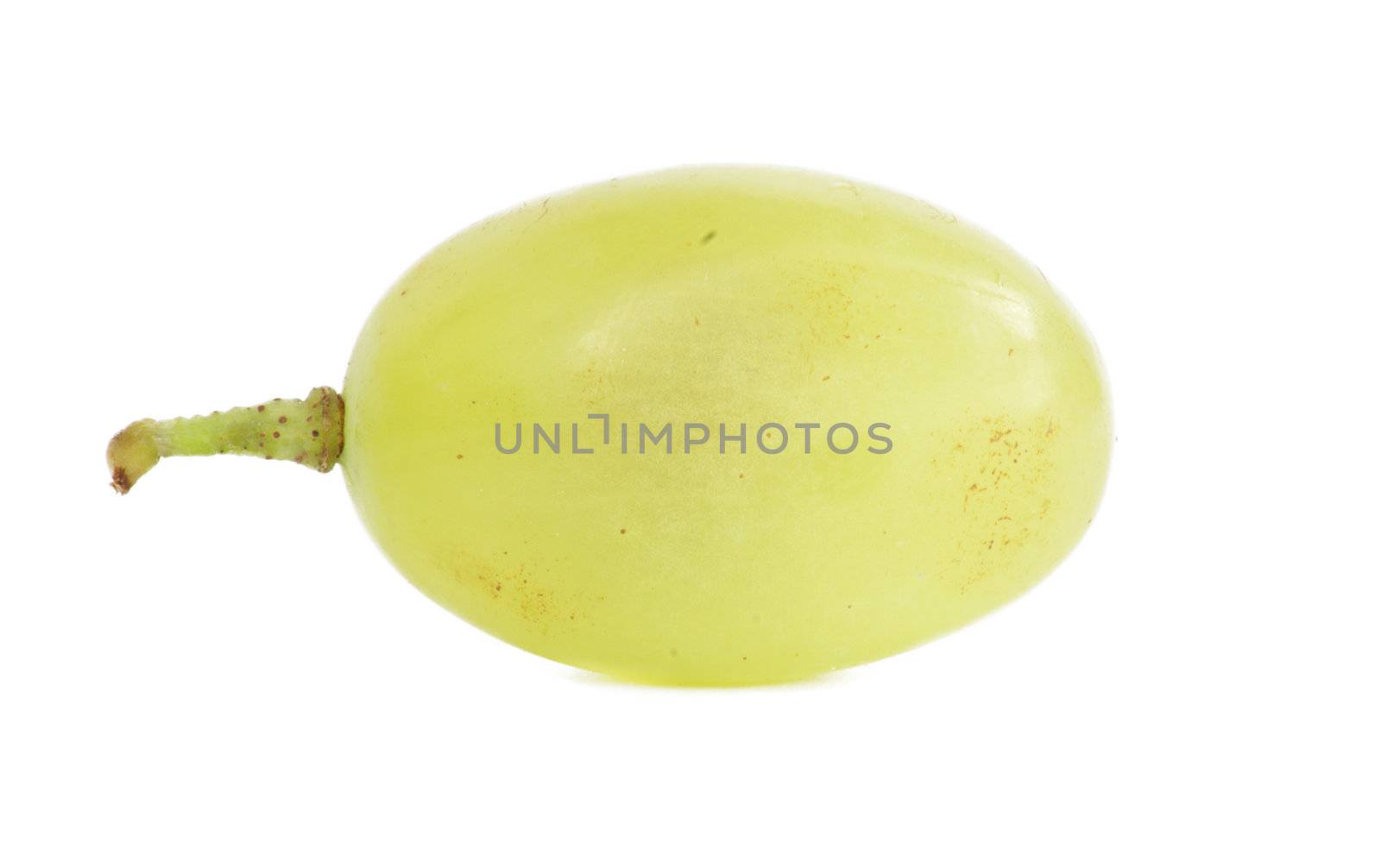 Translucent slice of green grape fruit, macro isolated on white 