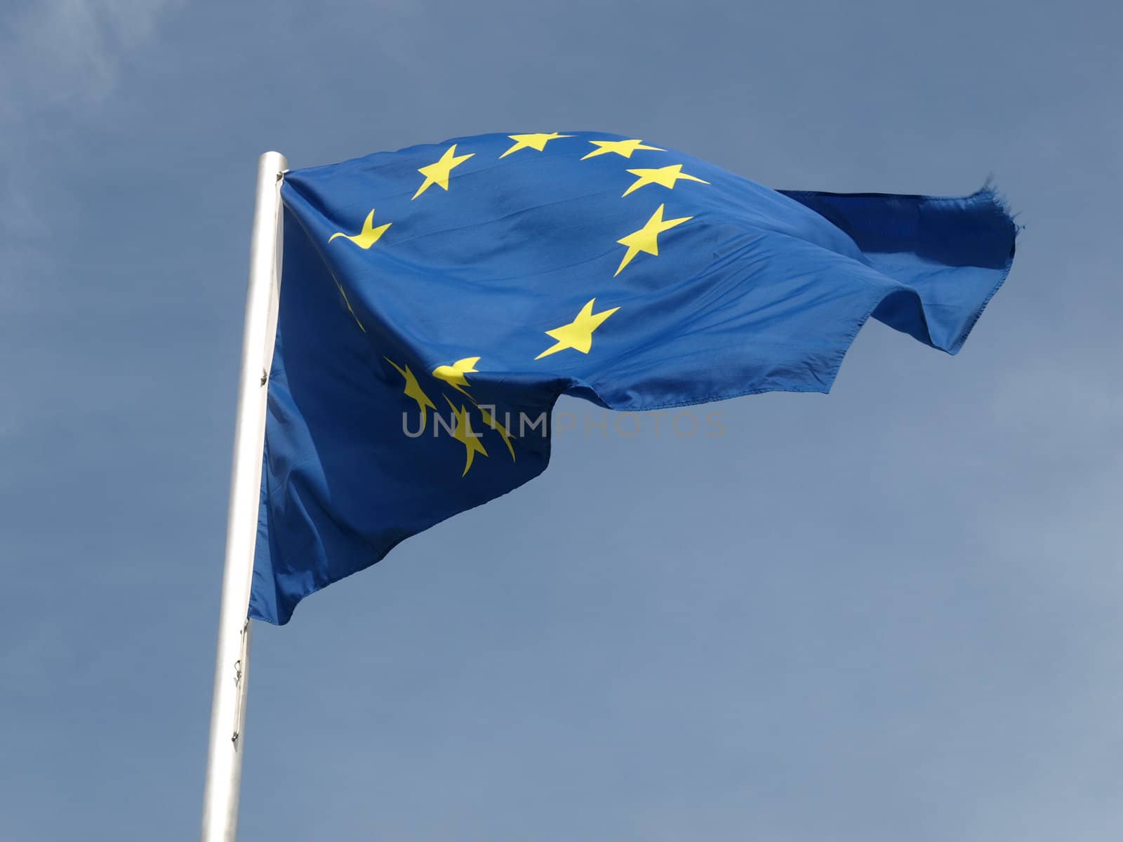 Flag of the European Union over blue sky